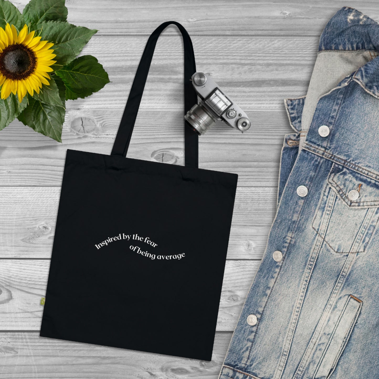 "Inspired by the fear of being average" Lumi Tote Bag